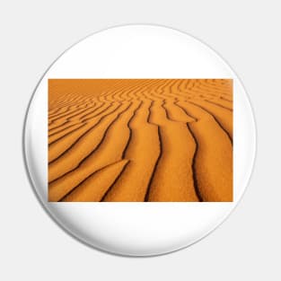 Orange sand pattern. Pin