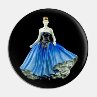 Bone China Figurine wearing a Blue Dress Pin