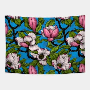 Blooming magnolia on blue Tapestry