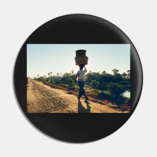 Woman Carrying Baskets on Head Walking in Burmese Countryside in Beautiful Morning Light Pin