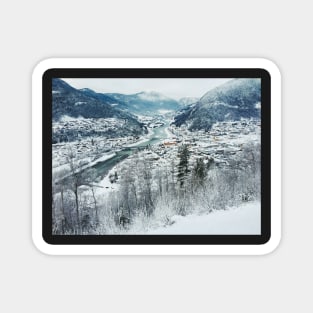 Wintertime - View on Snow-Covered Scandinavian Valley and Town Magnet