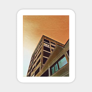 Jagged apartment block at dusk Magnet