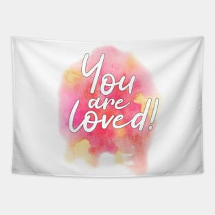 "You are loved" on pink and yellow watercolor splash Tapestry