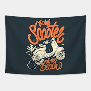 RIDING SCOOTER ON THE BEACH Tapestry