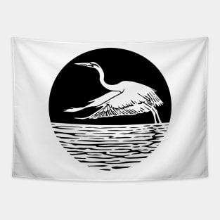 Great Blue Heron Flying in front of Sun Tapestry