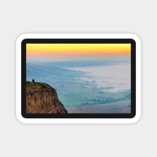 Man meditating at sunrise on Mam Tor, Castleton, Derbyshire,UK Magnet