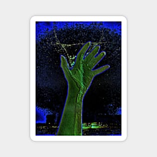 Digital collage and special processing. Hand reaching stars. Monster or great friend. Blue and green, very psychedelic. Magnet