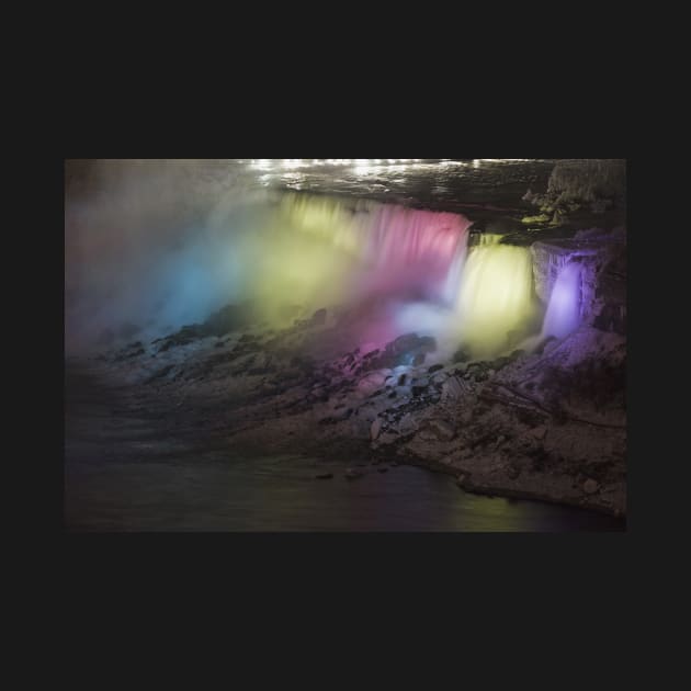 Rotating colored light display on american falls by Tianna Bahringer