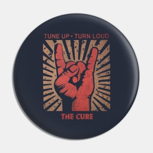 Tune up . Turn loud The cure Pin
