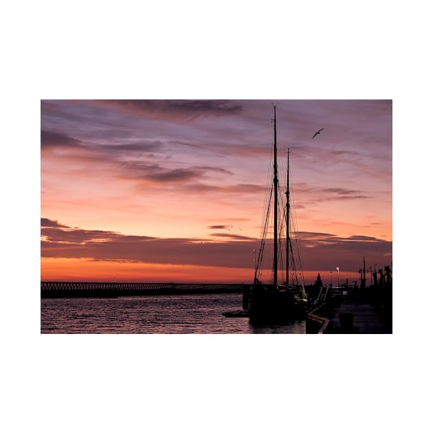 Sunrise over a Sailing Ship by Violaman