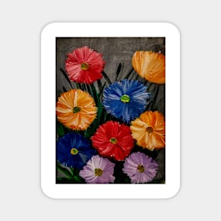 wildflowers growing free in red and orange and blue flowers . Magnet