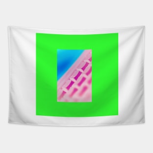 Colorful Pink Key Board with blue background and a green frame. Tapestry