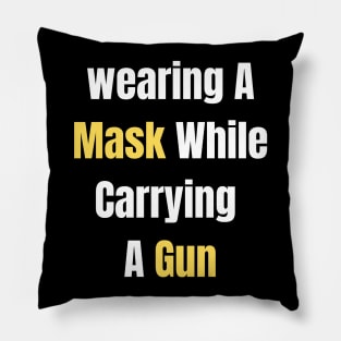 Wearing A MASK WHILE CARRYING A GUN Pillow