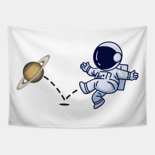 Astronaut plays Saturn Soccer Tapestry