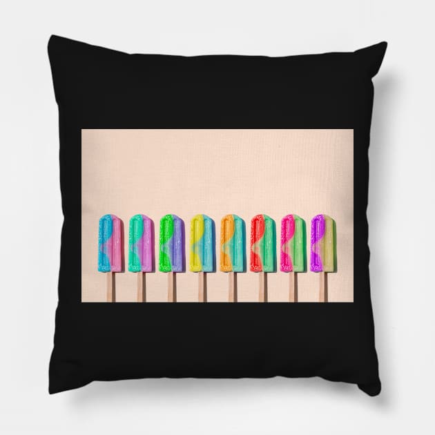 Row of rainbow-colored icecream lollies Pillow by karinelizabeth