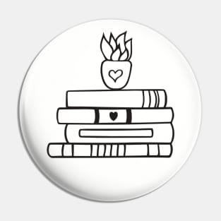 books and flower vase Pin