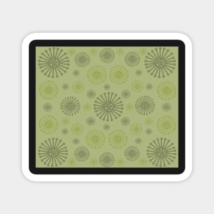 Gently on the Green. A tranquil design featuring wagon wheels in soft olive and mossy green tones. Magnet