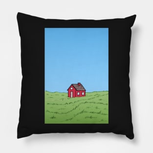 Small red house in the middle of a green meadow against a blue sky Pillow