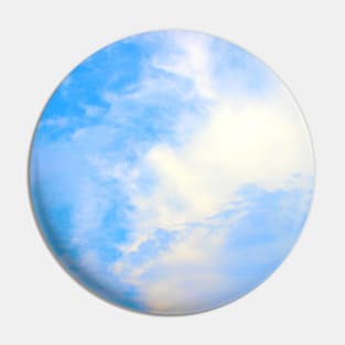 View of the sky split between puffy and thick clouds on the right and azure color on the left Pin