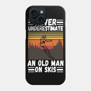 never underestimate an old man on skis Phone Case