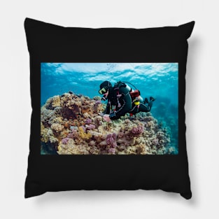 Diver gliding through red sea Pillow