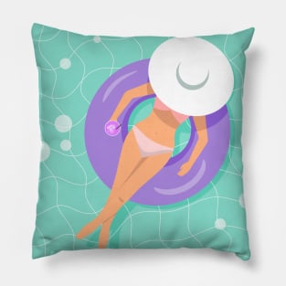 Woman floating on rubber ring with cocktail in her hand Pillow