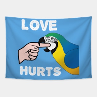 Love Hurts Blue and Gold Macaw Parrot biting Tapestry