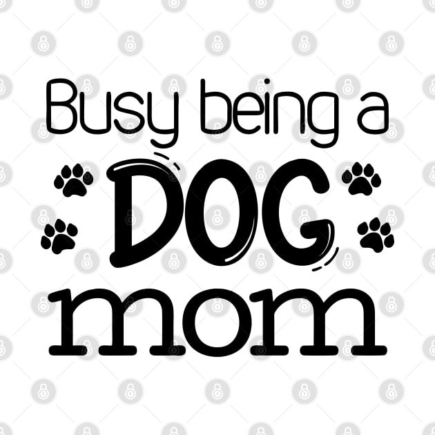 Busy being a dog mom by OgogoPrintStudio