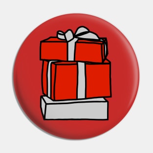 A Stack of Three Wrapped Christmas Gift Boxes Pin