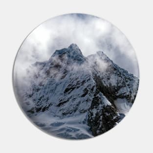 Savage cloud covered mountain Pin