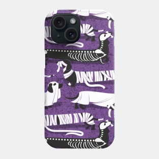 Spooktacular long dachshunds // pattern // studio purple background mummy ghost and skeleton dogs Phone Case