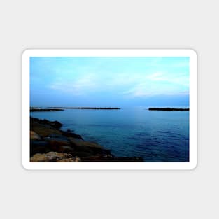 Deep blue Adriatic sea with a coast full of massive rocks Magnet