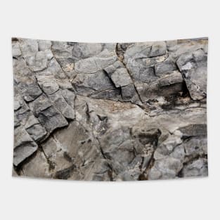 Tiny Squares Chissled Into Rock Formation Tapestry