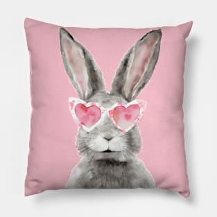 Smiling rabbit in heart-shaped glasses. Pillow