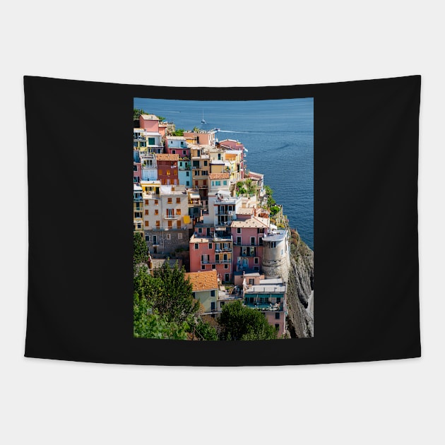 View on the cliff town of Manarola, one of the colorful Cinque Terre on the Italian west coast Tapestry by Dolfilms