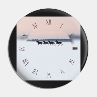 Four horses galloping on snowy paddock Pin