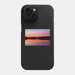 Serene view of calm lake and tree silhouettes Phone Case