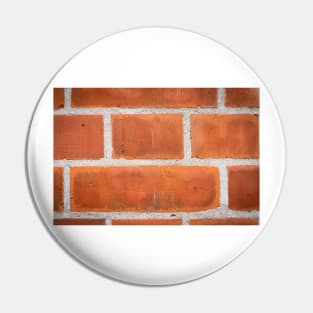 Red brick background clloseup pattern with white grout lines. Pin