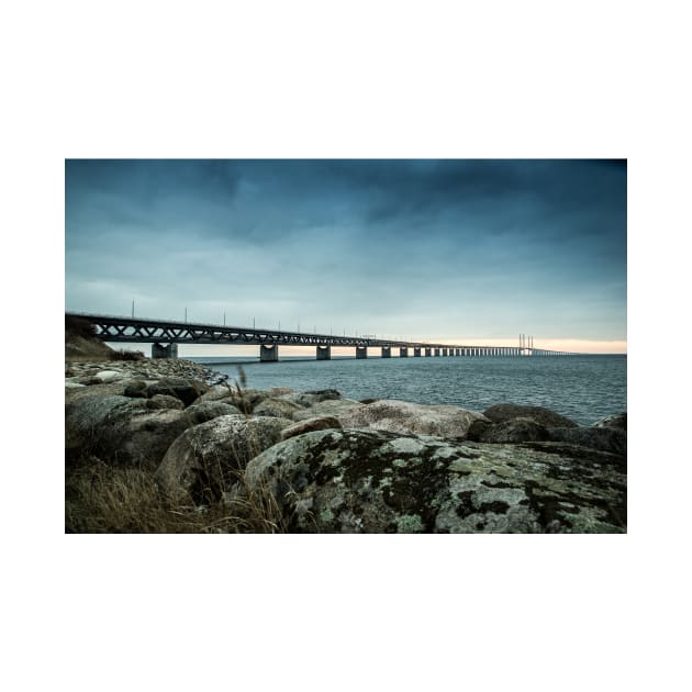 In the colorful evening light lies the Öresund Bridge, which connects Sweden and Denmark by connyM-Sweden