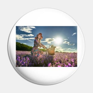 Young woman riding her bicycle in a lavender field Pin