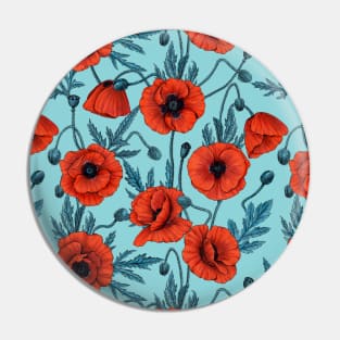 Poppies, red and blue on pool blue Pin