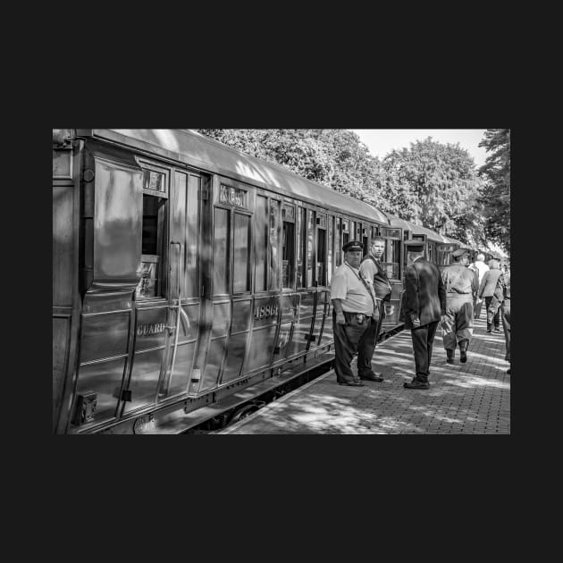 Train conductors on the platform of the Norfolk Poppy Line by yackers1