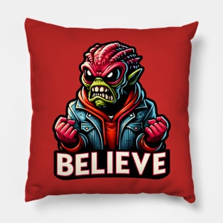 Furious alien monster with the text believe. Funny alien design Pillow