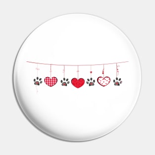 Black paw prints with hanging hearts Pin