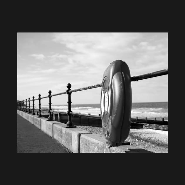 Life saver ring on the promenade at Cromer beach, Norfolk by yackers1