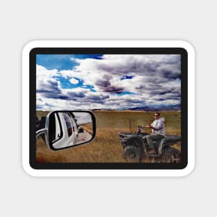 Canadian cowboy herder riding atv Alberta, Canada. Magnet