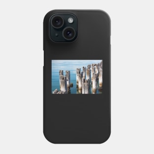 Old wooden piles in clear blue water in Melbourne, Australia. Phone Case