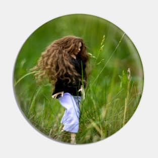 Dark haired girl walking in nature Pin