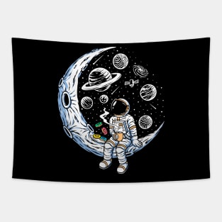 Astronaut Sitting on a Crescent Moon with Coffee & Donuts Tapestry