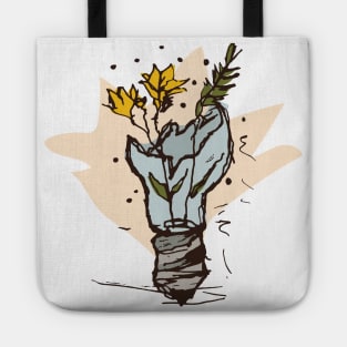 Broken light bulb with yellow flowers Tote